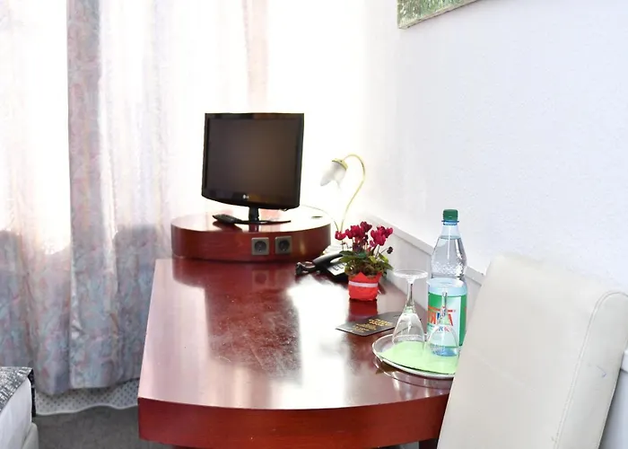 Muenchner Hof Отель